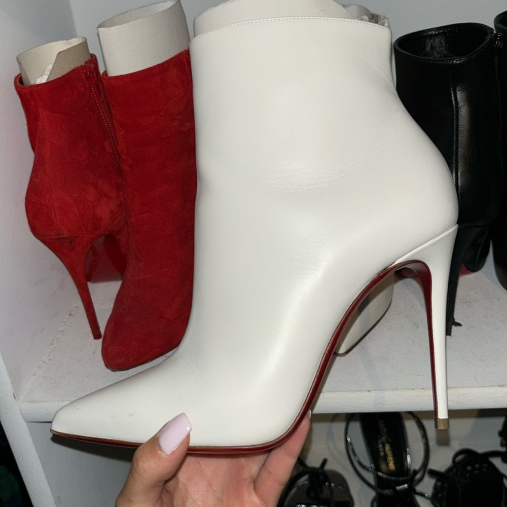 White Christian Louboutin boot